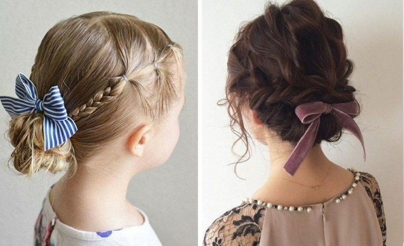 Bé gái với kiểu tóc búi thấp thanh lịch cài hoa