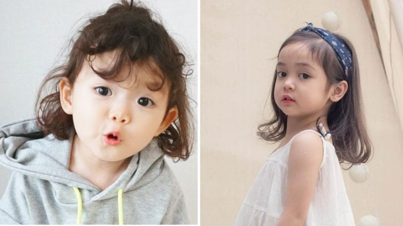 Bé gái với mái tóc uốn nhẹ nhàng đáng yêu