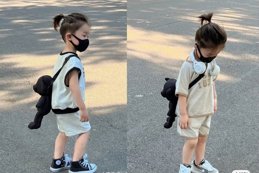 Bé trai cá tính với kiểu tóc Man Bun sành điệu, phù hợp với khuôn mặt dài.