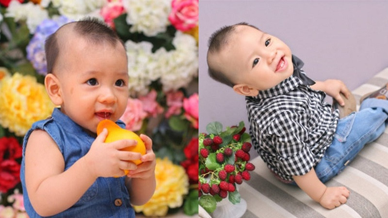 Bé trai với kiểu tóc ba giá tinh nghịch, đậm chất truyền thống