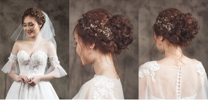 Cô dâu với kiểu tóc búi thấp thanh lịch, điểm xuyết phụ kiện tóc cưới, toát lên vẻ đẹp tinh tế, đơn giản mà sang trọng.