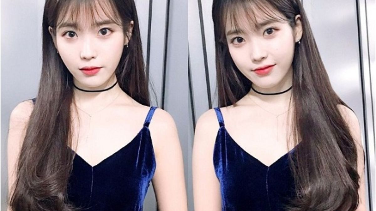 Cô gái với mái tóc duỗi thẳng uốn đuôi tự nhiên