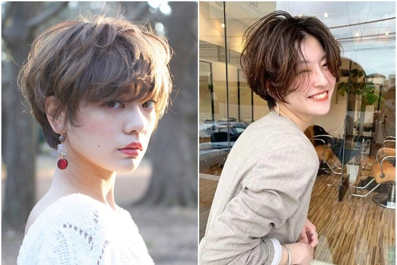 Cô gái với mái tóc tém xoăn nhẹ nhàng, kết hợp cùng áo dài, tạo điểm nhấn duyên dáng và thanh lịch