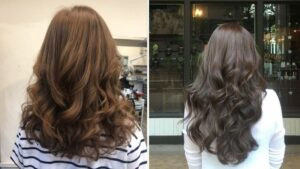 Cô gái với mái tóc uốn gợn sóng nhẹ nhàng