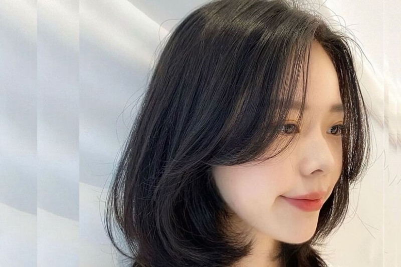 Cô gái với tóc ngắn layer mái bay lãng mạn