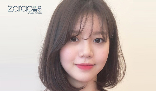 Gợi ý tóc ngắn ngang vai với mái thưa, giúp mẹ bầu mặt tròn thêm thanh thoát và trẻ trung.