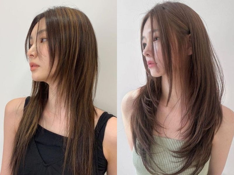 Hairstylist đang tạo kiểu tóc layer nữ với kỹ thuật cắt tỉ mỉ.