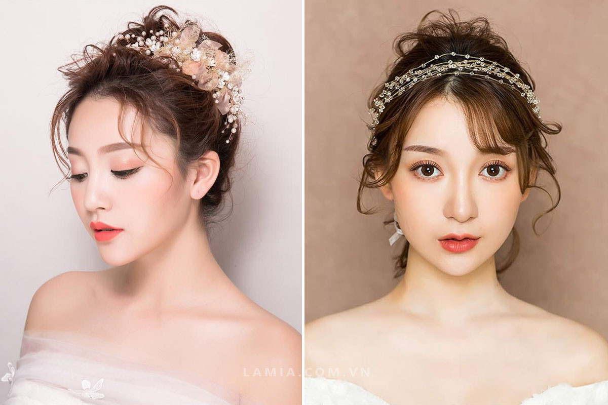 Kiểu tóc cô dâu búi cao gọn gàng, tôn lên vẻ đẹp thanh lịch và kiêu sa, rất thích hợp cho những chiếc váy cưới hở vai.