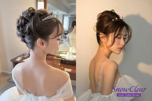 Kiểu tóc công chúa búi cao với những lọn tóc xoăn bồng bềnh tạo vẻ đẹp thanh lịch