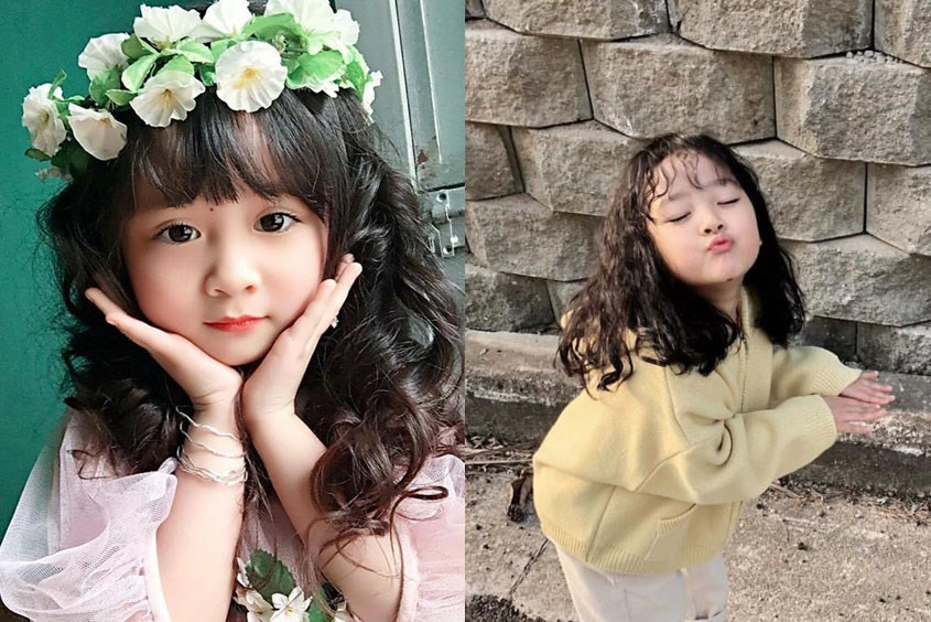 Kiểu tóc dễ thương cho bé gái tóc dài uốn xoăn ngang lưng