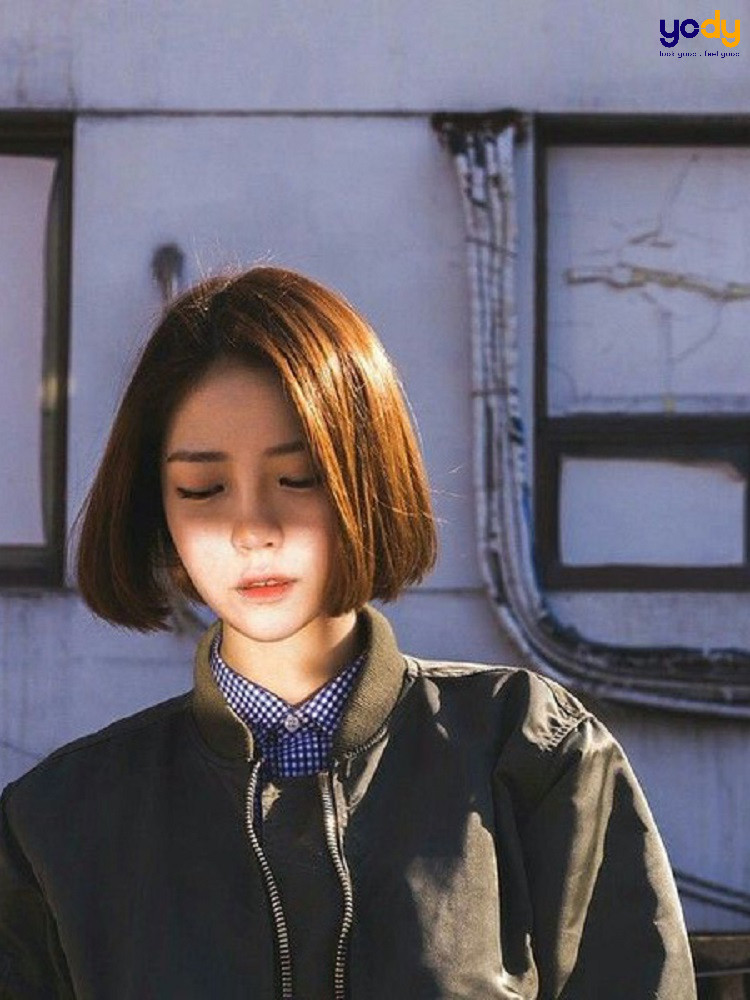 Kiểu tóc ngắn ngang cằm giúp kéo dài gương mặt tròn và cổ