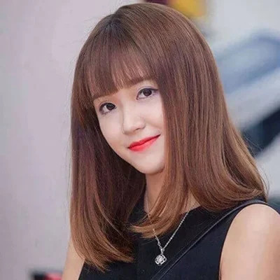 Kiểu tóc ngang vai ép cụp phồng hiện đại
