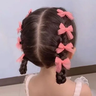 Kiểu tóc tết hai bên dễ thương cho bé gái