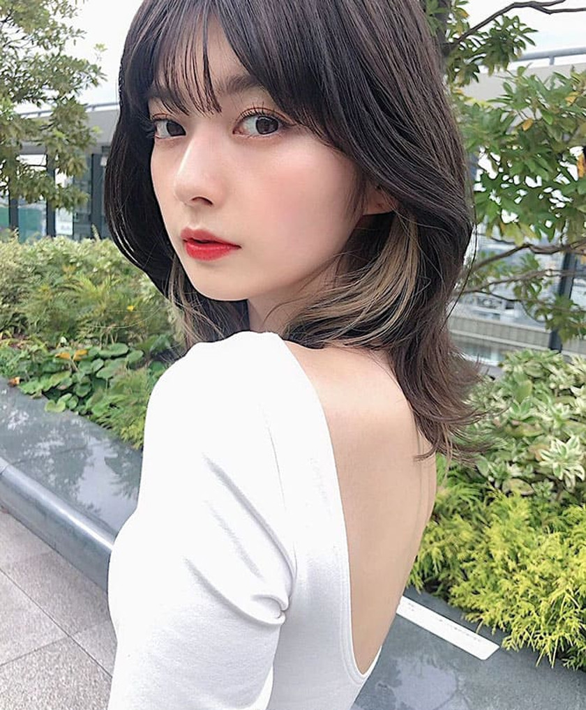 Kiểu tóc tomboy uốn cho nữ mặt tròn