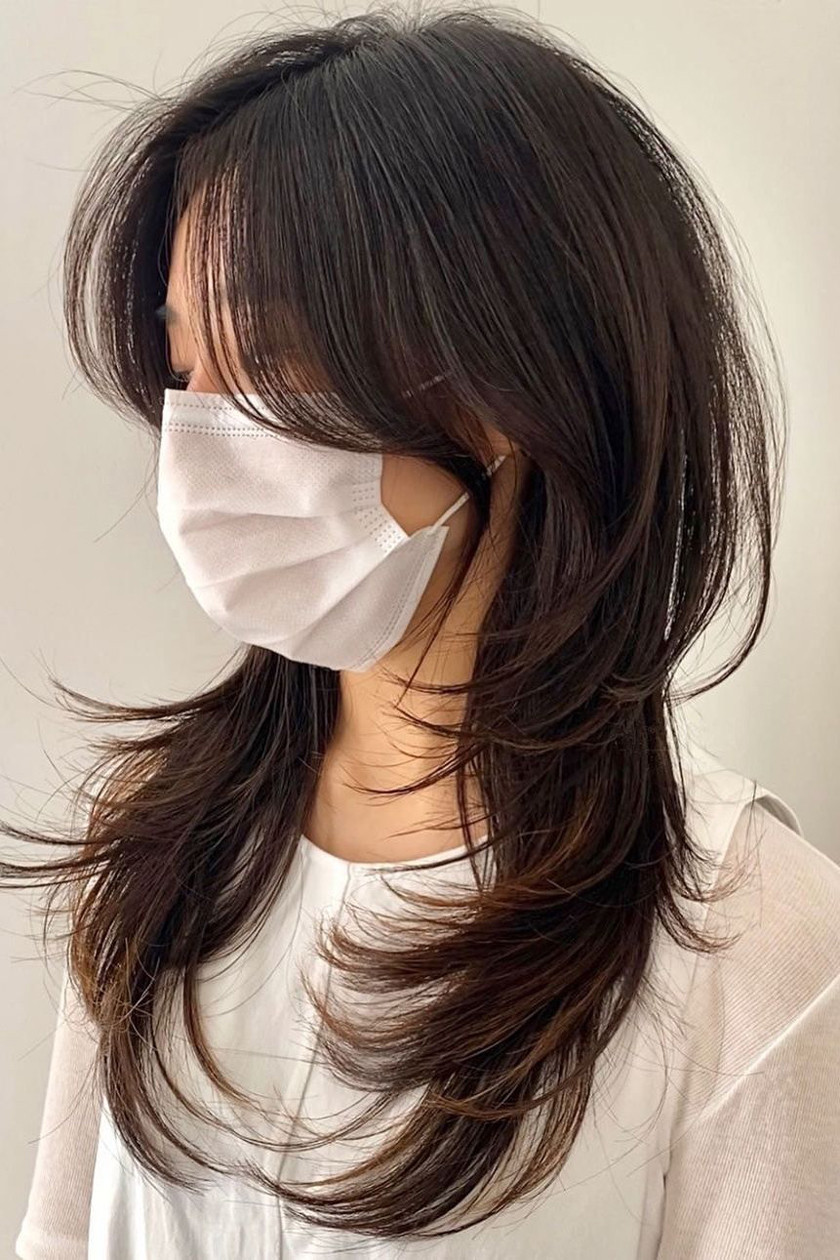 Kiểu tóc uốn chữ C cho nữ mặt tròn
