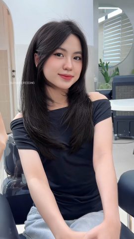 Mái tóc dài mượt mà, biểu tượng của sự thịnh vượng và tài lộc trong phong thủy, đặc biệt quan trọng cho người tìm kiếm vận may.