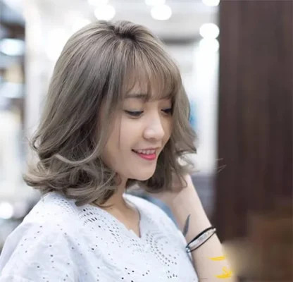 Mẫu tóc ngắn cụp lọn xoăn tự nhiên