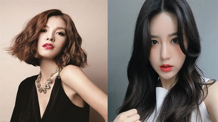 Mẫu tóc xoăn lọn to rẽ ngôi thanh lịch