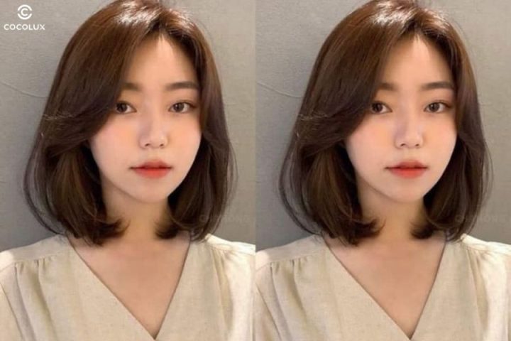 Một cô gái có mái tóc ngắn uốn cụp kết hợp mái thưa, gương mặt trái xoan rạng rỡ
