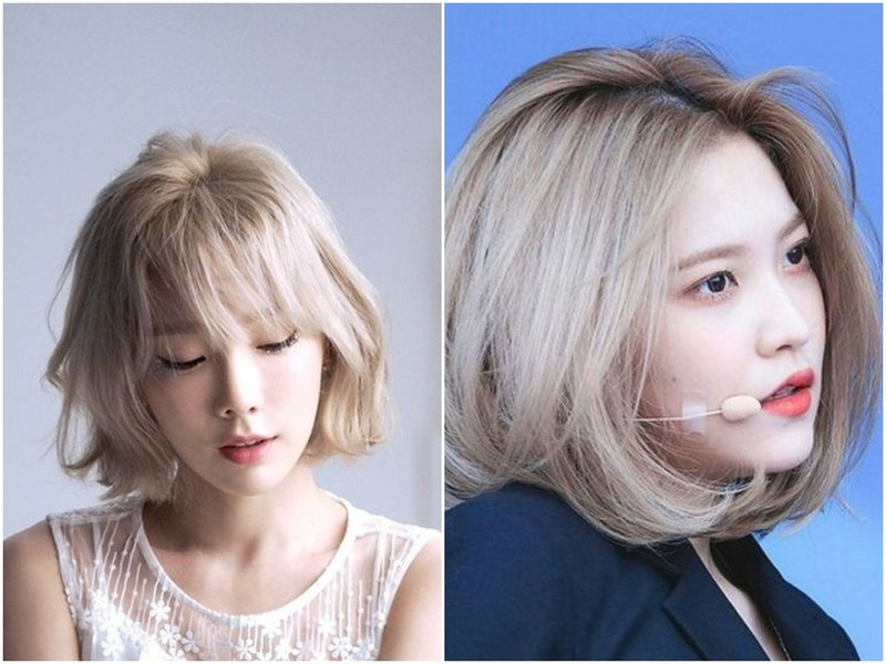 Người phụ nữ với tóc uốn cúp màu bạch kim nổi bật