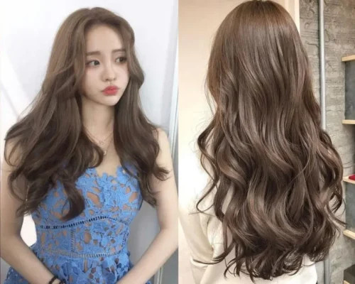 Phụ nữ trung niên nổi bật với tóc dài xoăn bồng bềnh