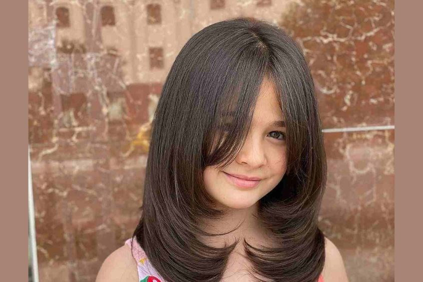 Tóc dài tỉa layer bồng bềnh cho bé gái 12 tuổi duyên dáng