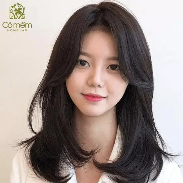 Tóc layer nữ mặt dài mái bay nhẹ nhàng