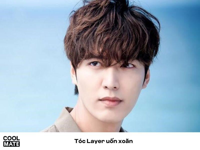 Tóc layer uốn xoăn trẻ trung, năng động cho khuôn mặt kim cương