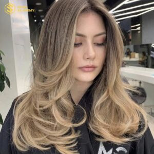 Tóc layer xoăn lọn với balayage vàng tây đẹp khó cưỡng
