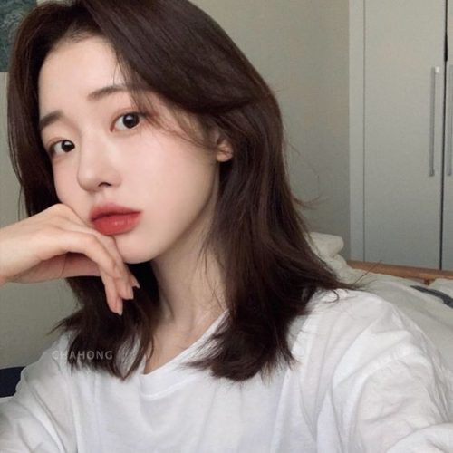 Tóc lửng tỉa tầng hiện đại cho mặt vuông tròn