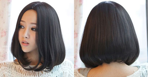 Tóc ngắn ép cụp dài ngang vai với ngôi giữa thanh lịch, tạo nên vẻ ngoài dịu dàng và cuốn hút