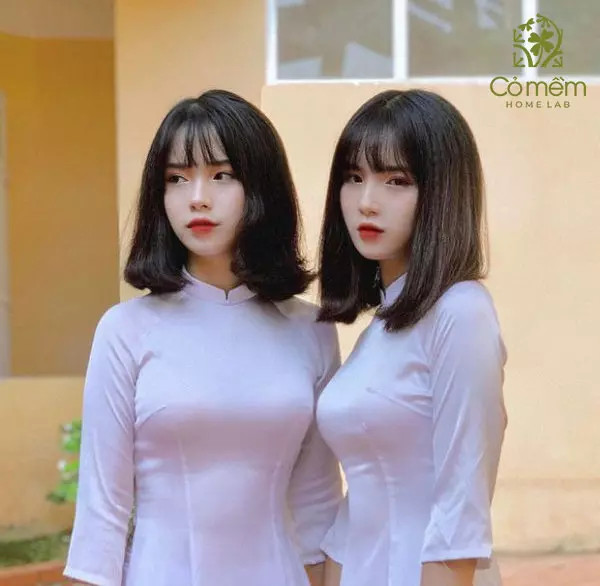 Tóc ngắn mái thưa duyên dáng và trong sáng khi mặc áo dài