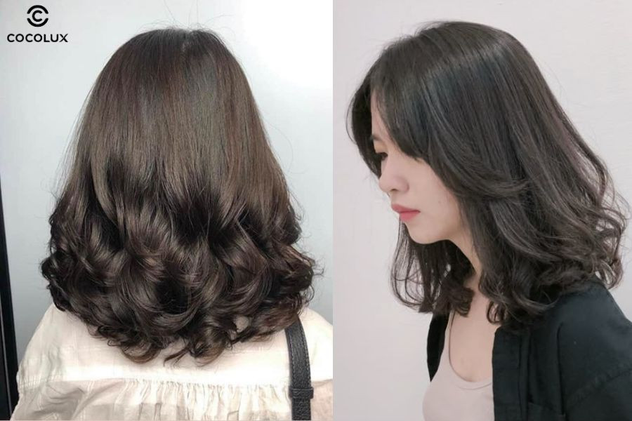 Tóc xoăn sóng nước ngang vai làm dịu đường nét khuôn mặt, mang đến vẻ nữ tính, hài hòa