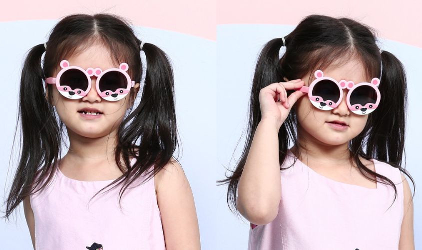 Bé gái với kiểu tóc cột cao hai bên năng động, trẻ trung, phù hợp đi học, đi chơi