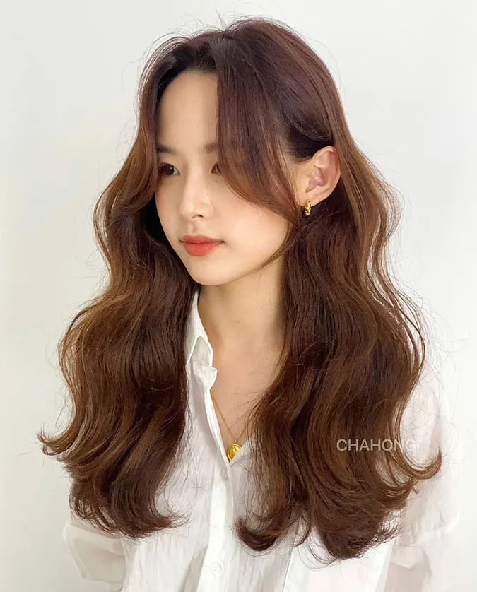 Kiểu tóc xoăn gợn sóng cho người đầu to nữ