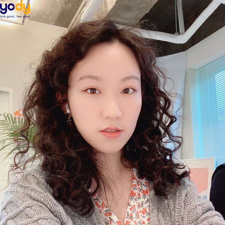 Kiểu tóc xoăn happy xù cho mặt dài