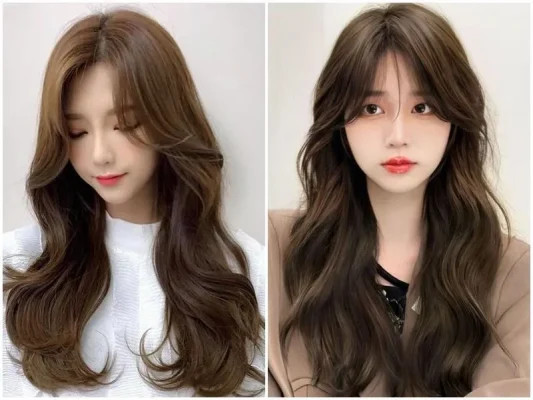 Mái thưa uốn nhẹ kết hợp với tóc dài, giúp gương mặt gầy má hóp trở nên cân đối và thanh thoát hơn.