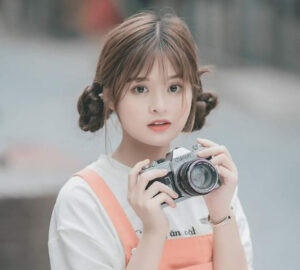 Tóc búi thấp hai bên dễ thương chụp kỷ yếu
