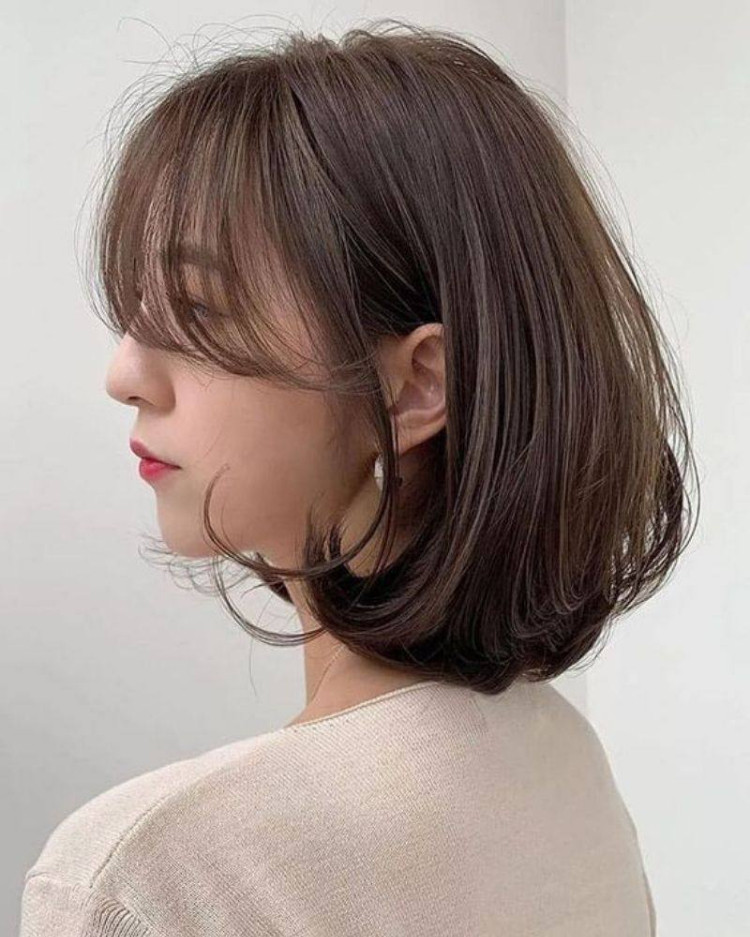 Tóc ngắn uốn chữ C cho mặt tròn