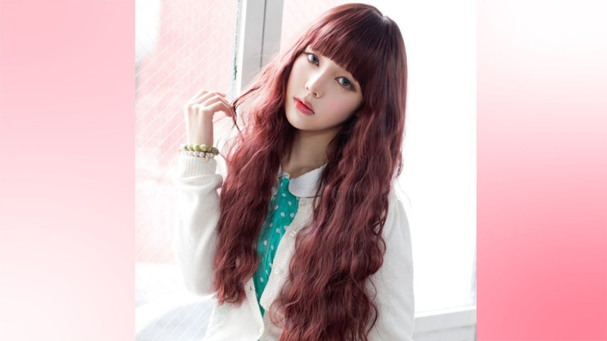 Tóc uốn xù đũa nhẹ nhàng cho khuôn mặt dài, tạo vẻ trẻ trung