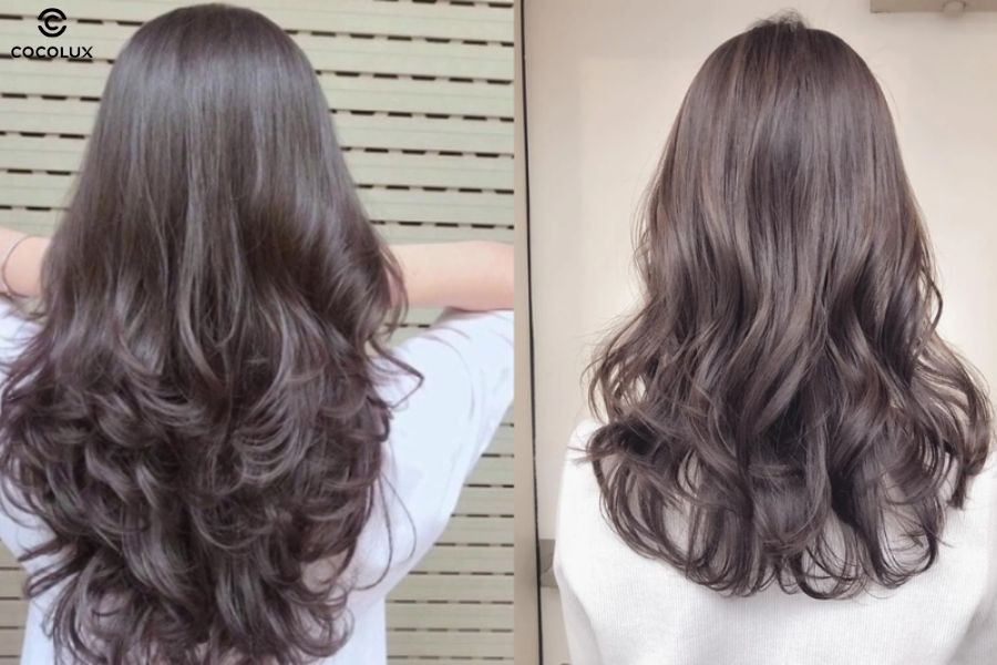 Tóc xoăn nhẹ phần đuôi ngang lưng là kiểu tóc “quốc dân” tôn dáng mặt và dễ chăm sóc.
