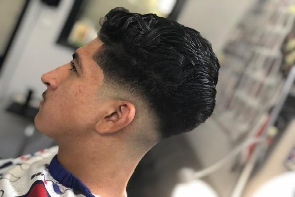 High Fade tạo độ tương phản mạnh mẽ cho mái tóc nam